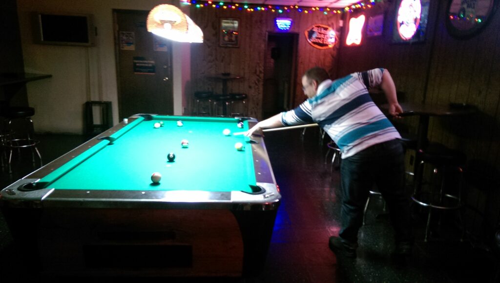 Jason shooting pool