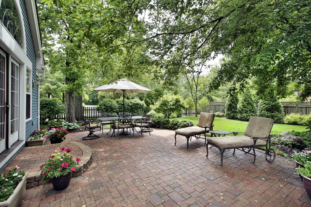 bigstock-Brick-patio-with-table-umbrell-16568294