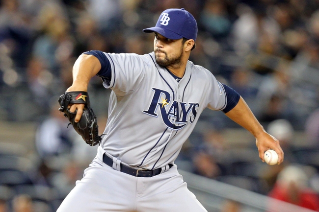 Apr 28, 2015; Bronx, NY, USA; Tampa Bay Rays relief pitcher Xavier Cedeno (31) pitches against the New York Yankees during the seventh inning at Yankee Stadium. Mandatory Credit: Brad Penner-USA TODAY Sports